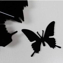 Stiilne seinakell liblikatega, ajatu sisustuselement