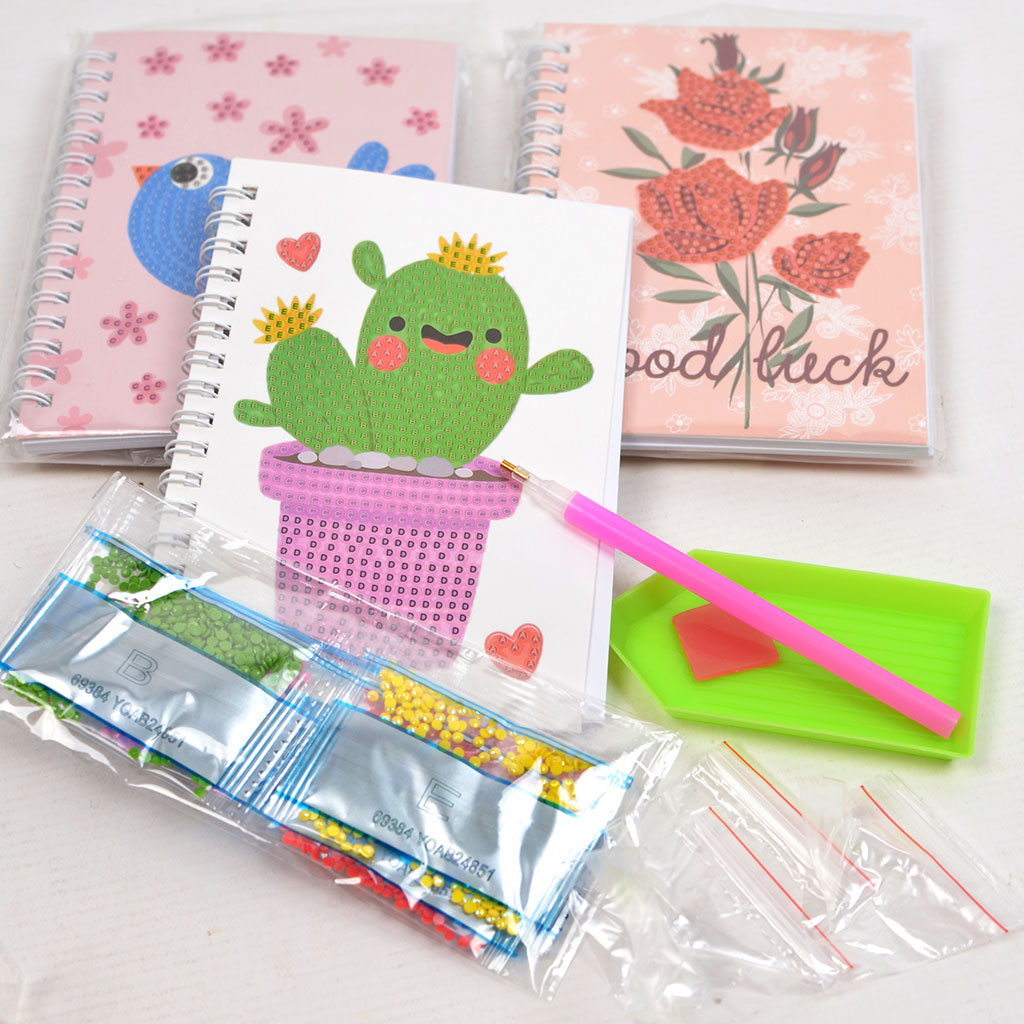 Märkmik teemanditikandiga